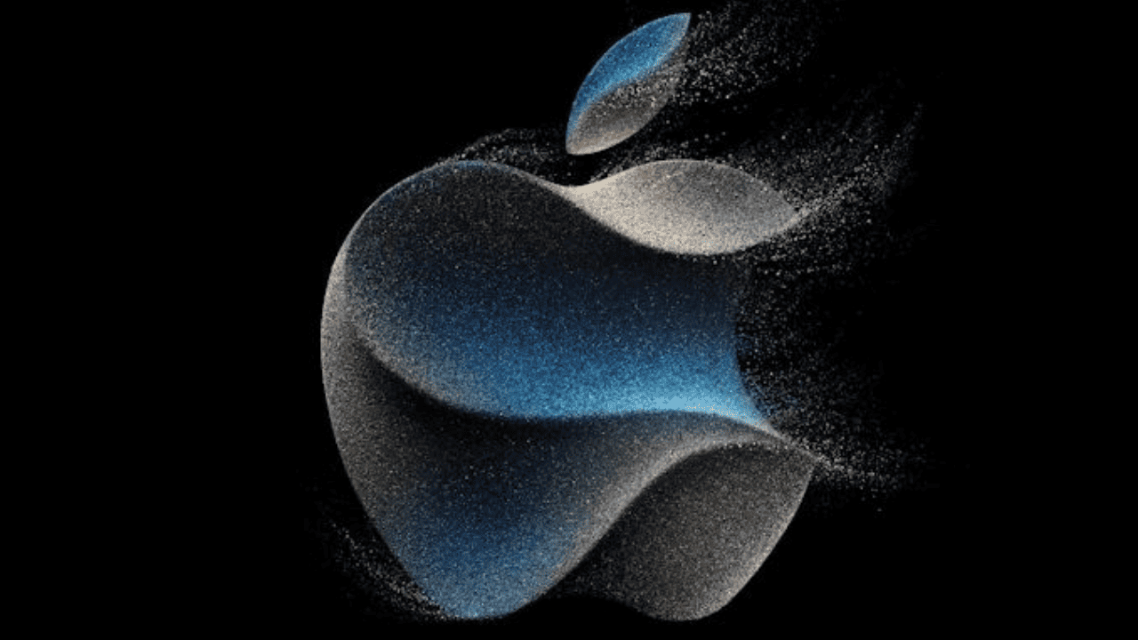 Apple Logo fading into sand
